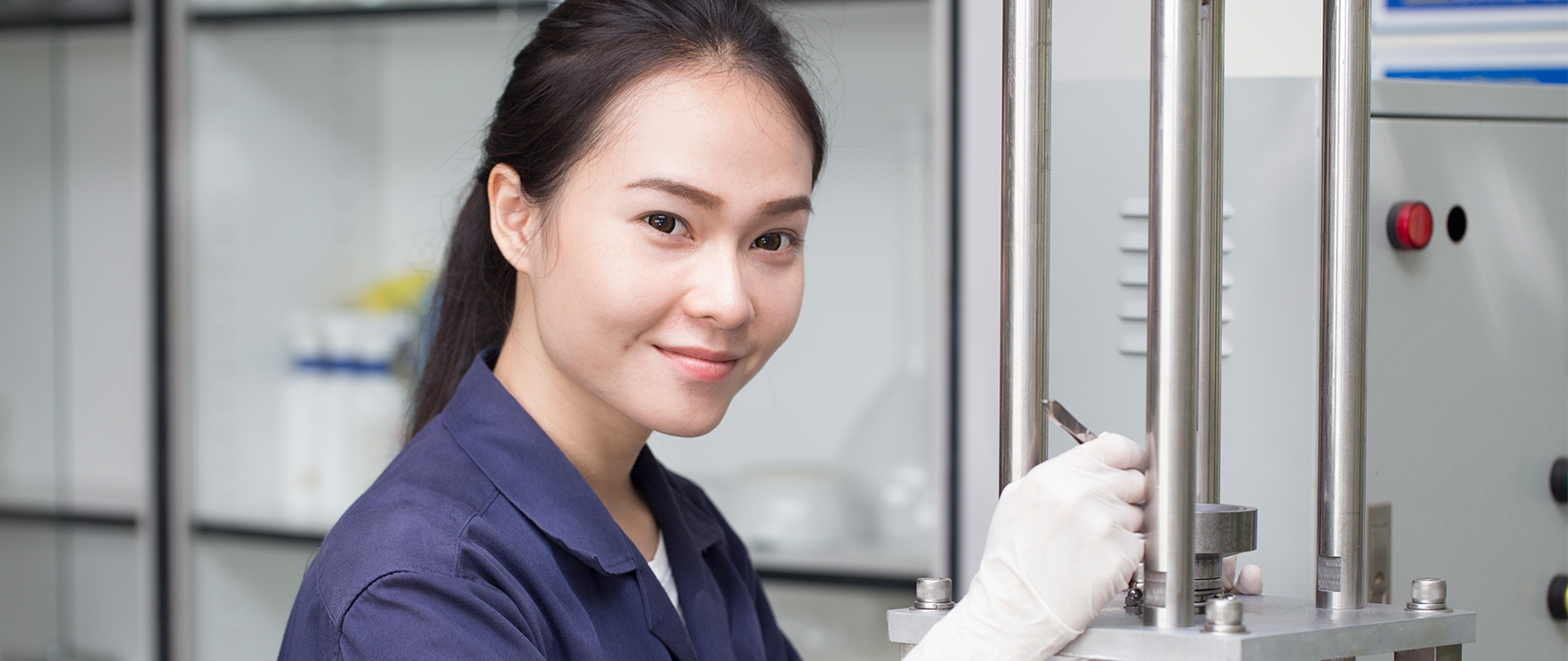 Female Engineer Testing Machine.png
